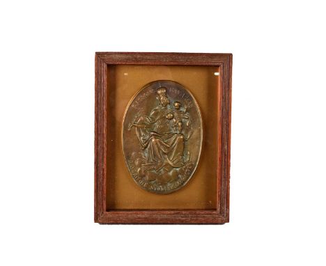 A Cast Bronze Plaque of Madonna and Child on a Cloud, the oval, single sided plaque with central figures surrounded with insc