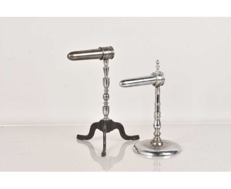 A Chrome Plated Goffering Iron, having cast tripod base, the other, nickel plated, with wide circular base, the taller being 