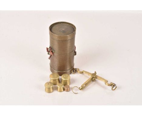 A set of 19th Century Asian Brass Scale, complete with five graduated weights, in brass two piece carry case