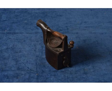 A Vintage Mondragon Chimney Iron, having hand guard, and turned wooden handle