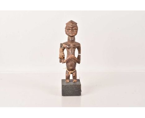West African Fine Statue, threaded tie to waist, and in culture repair to right arm, patina of age, approx. 18cm H, excluding