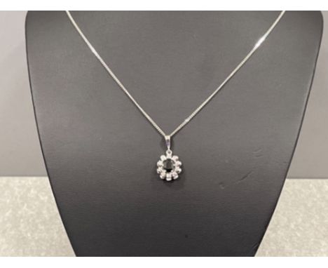 Stunning ladies white gold sapphire and diamond pendant with chain.