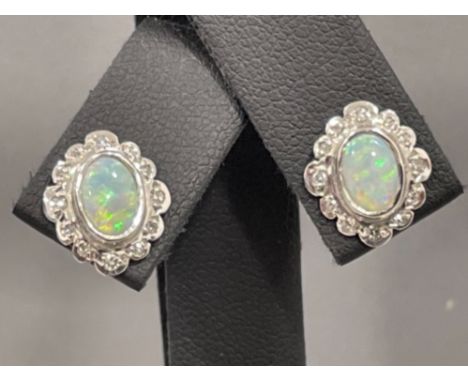 Ladies 9ct white gold Opal and diamond stud earrings