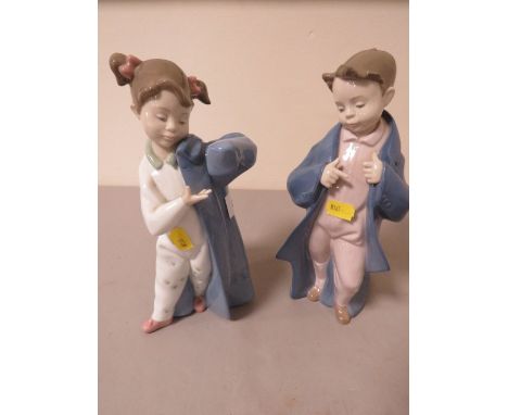 A pair of Nao figures of a girl and boy together with a Franklin Mint Figurine and a Royal Dux figure A/F