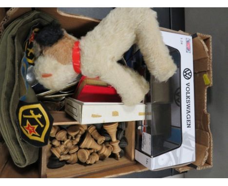 A tray of collectables to include a chess set, hat with Russian enamel badges etc