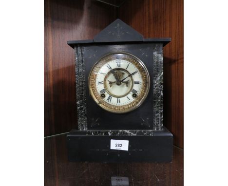 A slate mantle clock 