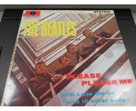 A collection of LP records to include The Beatles Please Please Me, Bruce Springsteen Born In The U.S.A, Solid Gold T-Rex, El