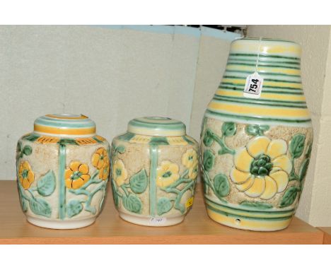 THREE BOURNE DENBY DANESBY LAMP BASES HAVING RELIEF MOULDED FLOWER DECORATION, minus fittings, approximate height of tallest 