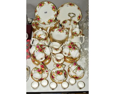 ROYAL ALBERT 'OLD COUNTRY ROSES' TEA, COFFEE AND DINNERWARE, including large teapot, coffee pot, seven tea cups, saucers and 