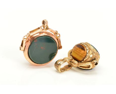 TWO 9CT GOLD SWIVEL FOBS, the first of circular outline set with bloodstone and carnelian, with 9ct hallmark, rubbed, the sec