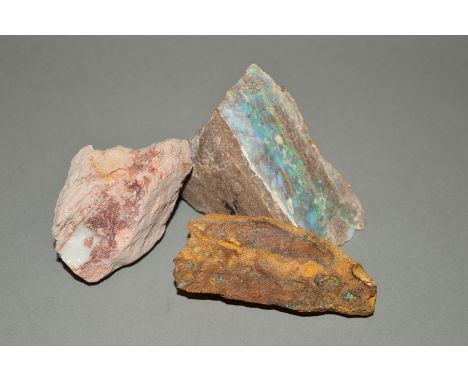 THREE PIECES OF ROUGH OPAL, to include a rough piece of precious opal in matrix, measuring approximately 8cm, a large piece o