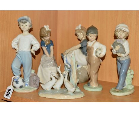 A LLADRO FIGURE, 'Starting Forward' No 7605 (Rotary International), height 22cm, together with five Nao figures/group, to inc