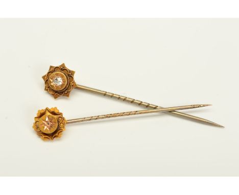 TWO LATE VICTORIAN 15CT GOLD DIAMOND STICKPINS, the first designed as an old European cut diamond in a star setting to the ro