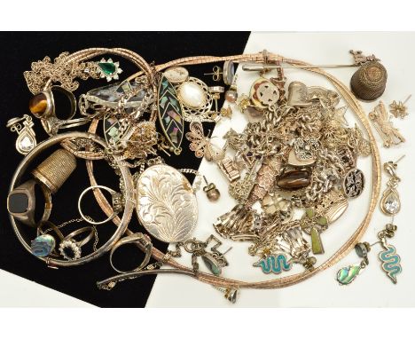 A SELECTION OF SILVER AND WHITE METAL JEWELLERY, to include a hinged bangle, charm bracelet, a pair of Mexican Alpaca inlaid 
