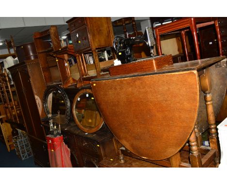 A QUANTITY OF OCCASIONAL FURNITURE, to include a reproduction oak nest of three tables, oak bedside unit, two oak gate leg ta
