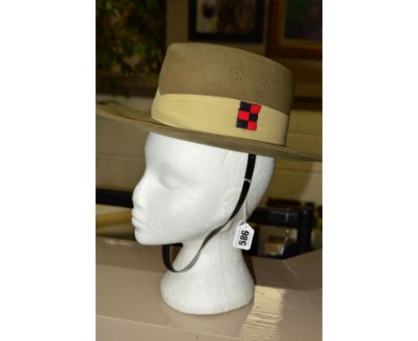 A FINE EXAMPLE OF A GHURKA RIFLES 'SLOUCH HAT' IN BEIGE, with inner lining strap etc, and bearing the patch of King Edward VI