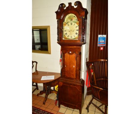 A GEORGE III OAK, MAHOGANY AND EBONY STRUNG EIGHT DAY LONGCASE CLOCK, the hood with a swan neck pediment flanked by turned up