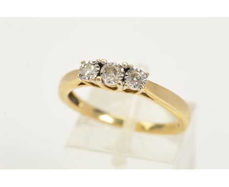 A 9CT GOLD THREE STONE DIAMOND RING, designed as three graduated brilliant cut diamonds each within an illusion setting, with