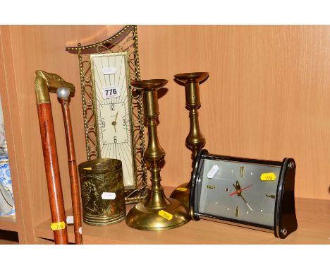 A PAICO ART DECO STYLE WALL CLOCK OF BRASS CONSTRUCTION WITH ARABIC NUMERALS AT THE QUARTER HOUR, approximate height 40cm, to