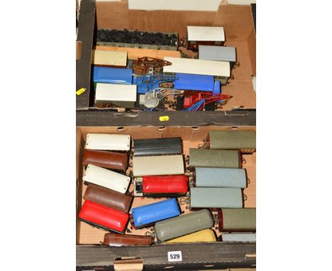 A QUANTITY OF UNBOXED AND ASSORTED HORNBY 0 GAUGE ROLLING STOCK, all in playworn condition, includes some repaints and conven