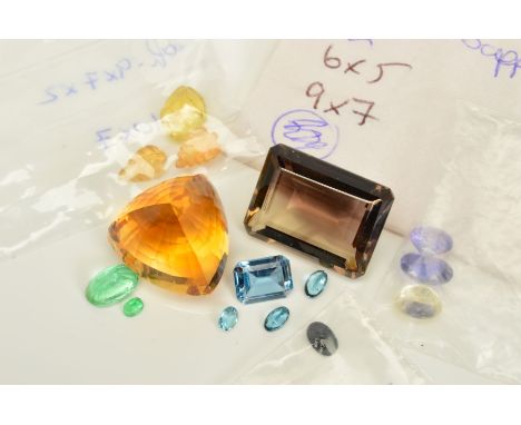 A MISCELLANEOUS GEMSTONE COLLECTION, to include an emerald measuring approximately 9mm x 5mm, missed colour sapphires, two ma