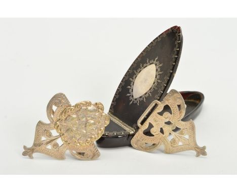 A LATE GEORGIAN TORTOISESHELL PATCH BOX AND LATE VICTORIAN PLATED BUCKLE, the patch box of navette outline, hinged lid and in