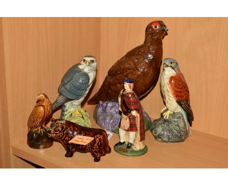 A GROUP OF NOVELTY CERAMIC WHISKY FLASKS, to include Beswick 'Grouse' No 2561 (with removable head), 'Eagle' No 2104, 'Kestre