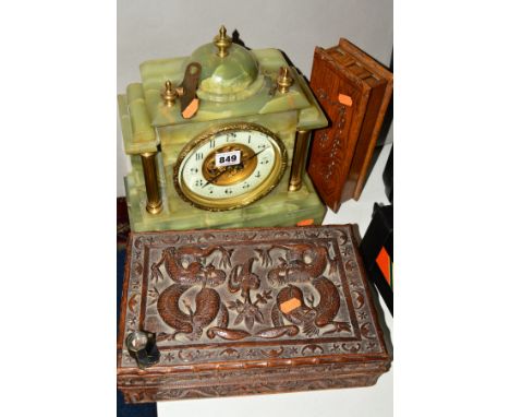 A 20TH CENTURY GREEN ONYX MANTEL CLOCK, temple shaped case with brass columns, Arabic dial, approximate height 31cm, with two