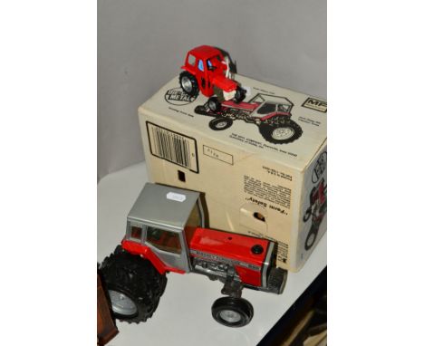 A BOXED ERTL MASSEY FERGUSON 698 TRACTOR, No 1102 1/20 scale, missing exhaust pipe from bonnet but otherwise appears complete