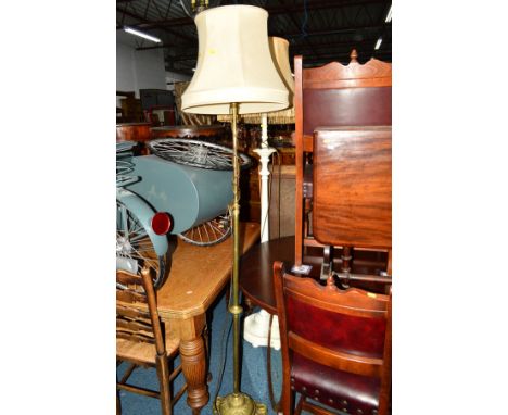 A BRASS TELESCOPIC STANDARD LAMP with a shade together with another standard lamp with shade and a modern wall mirror (3)