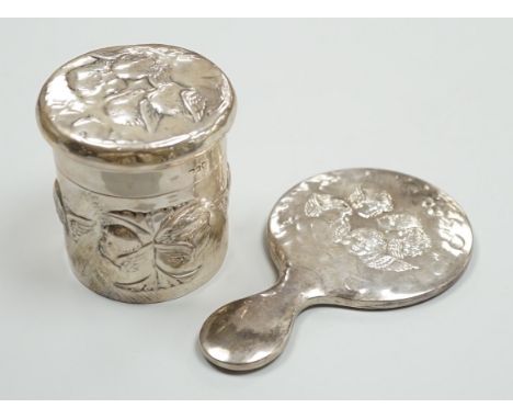 An Edwardian repousse silver Reynolds Angels toilet jar and cover, by William Comyns, London, 1901 and a later similar hand m