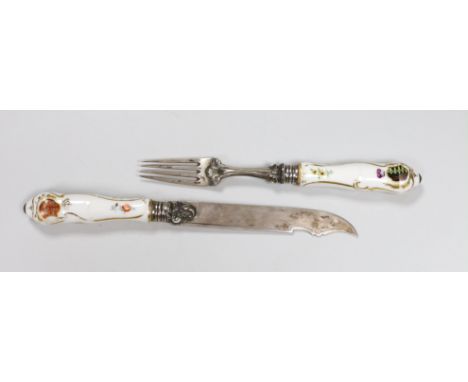 A German porcelain handled silver knife and fork, armorial crests