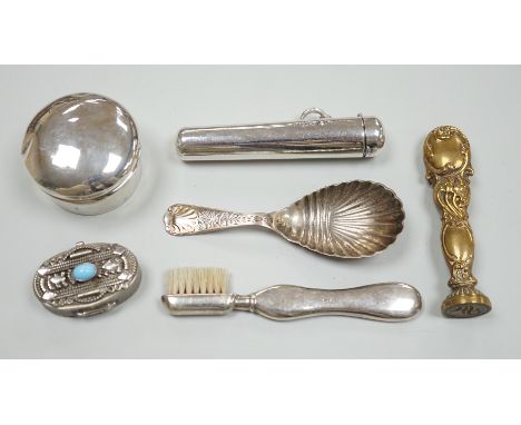 A late Victorian silver caddy spoon, 92mm, a silver cigarette holder, toothbrush, two trinket boxes and a brass seal.