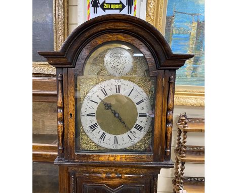 A 1920's oak longcase clock, height 194cm