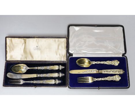 A cased George IV silver gilt christening trio (spoon, knife and fork) by Ely &amp; Fearn, London, 1823 and one other cased V