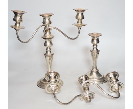 A pair of silver plated candelabra
