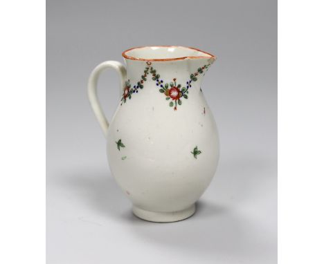 An 18th century Caughley rare factory painted sparrowbeak with a simple floral chain and orange rim. 9cm high