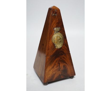 A 19th century mahogany metronome with key, 23ms high