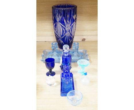 A group of mostly blue glass, largest item engraved vase 32cms high