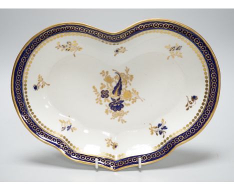 An 18th century Caughley kidney shaped dish with blue and gilt decoration, 28cms wide