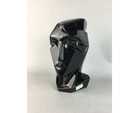 ART DECO STYLE CERAMIC SCULPTURE, in the form of a stylised face, in black, 32cm high