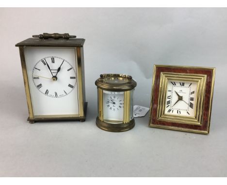 SMALL REPRODUCTION BRASS OVAL CARRIAGE CLOCK, along with two other clocks (3)