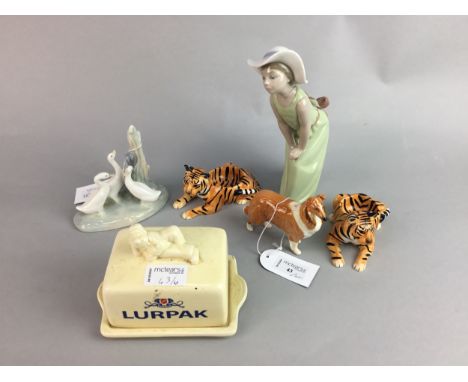 BESWICK FIGURE OF A BORDER COLLIE, 9cm high, along with two ceramic tiger form eggcups, Lladro female figure (head broken off