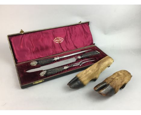 PAIR OF TAXIDERMY DEER FEET, along with a cased carving set, two model rifles, a glass pistol and a spear head (5)