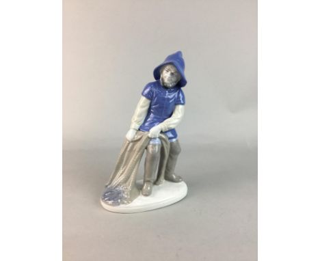 CERAMIC FIGURE OF A FISHERMAN, in the Spanish style, in blue and grey, 25cm high