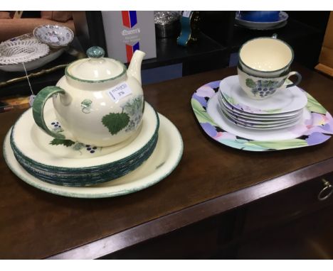 POOLE POTTERY PART DINNER SERVICE, with foliate motif decoration, comprising tea pot, 6 dinner plates, 6 six plates, 4 bowls,