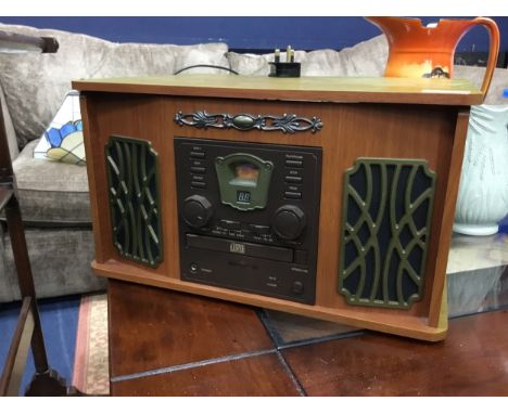 AKURA MUSIC CENTRE, with record player, cd player and radio functions, in stained wood case, 42cm wide