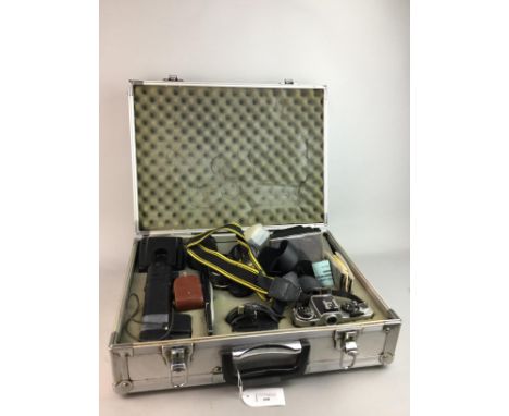 NIKON CAMERA WITH FOUR LENSES, along with a light meter, flash and carry case
