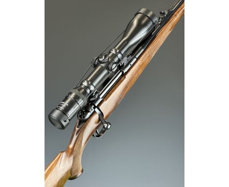 Heym SR 21 7mm Remington Magnum bolt-action rifle with chequered semi-pistol grip and forend, raised cheek piece, sling mount
