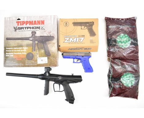 A collection of airsoft and paintball items comprising ZM17 Super Power 6mm airsoft pistol, Tippman Gryphon FX paintball gun 